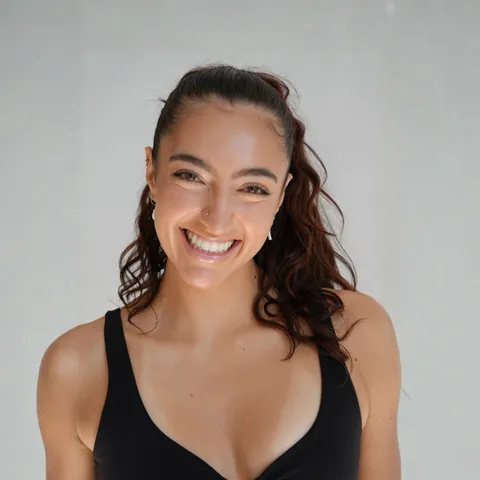 LIZLATES, who leads HIIT Pilates with LIZLATES